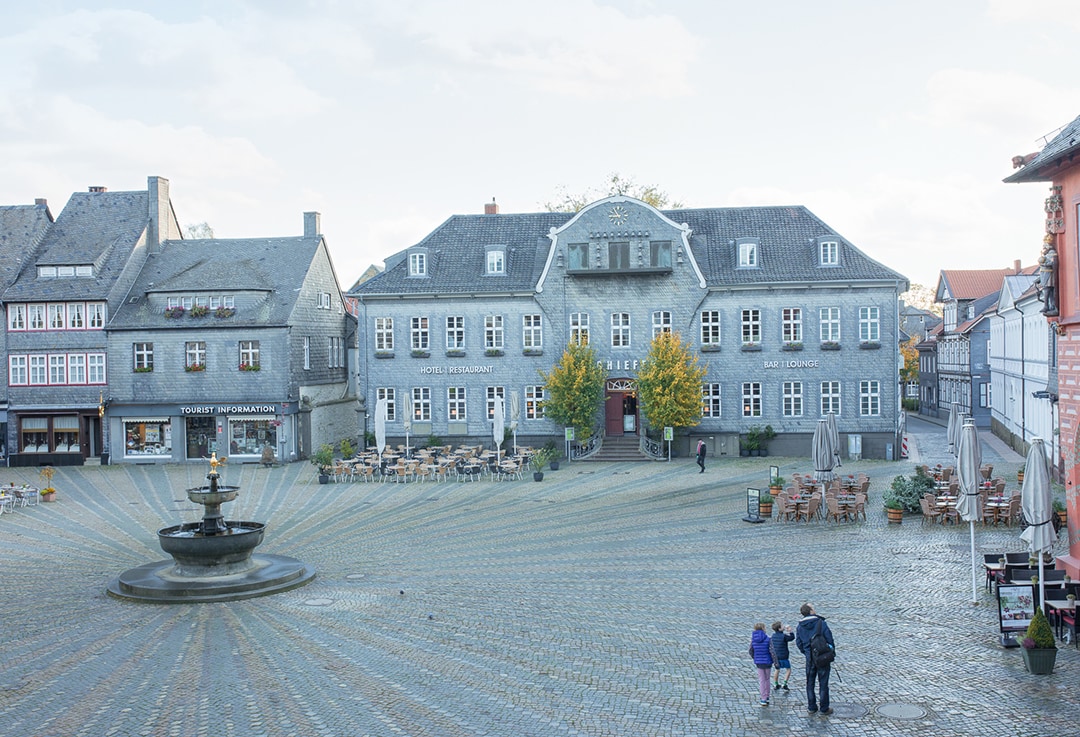 Ancient town square in Eggenfelden, Germany with historic buildings and cobbled streets.
